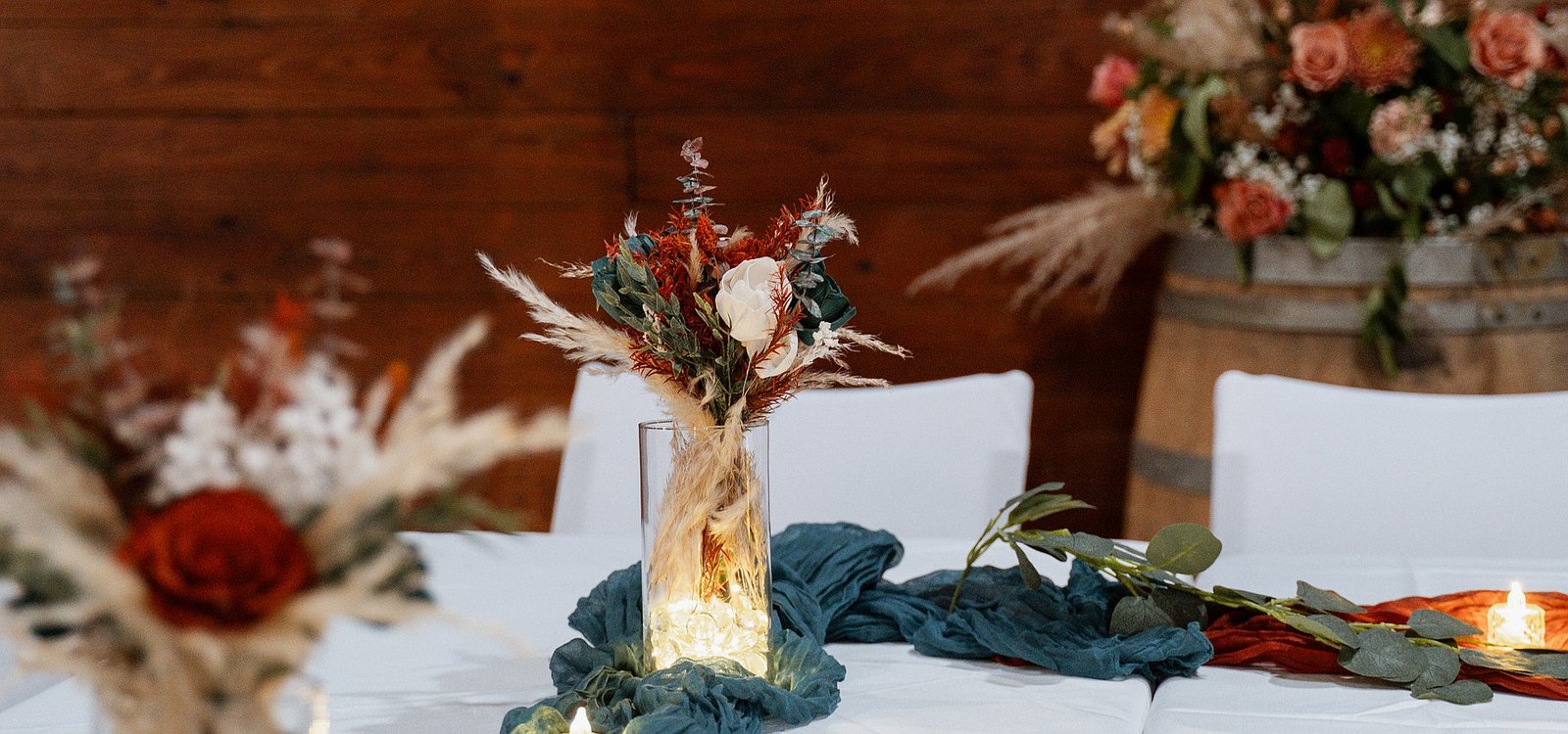 Elegantly set reception tables at Manx Farms